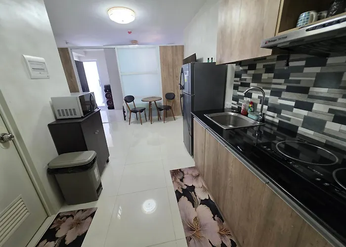 Jearl Cozy And Homey Penthouse With Balcony At Primeworld District Mactan Tower P Апарт-отель Мактан